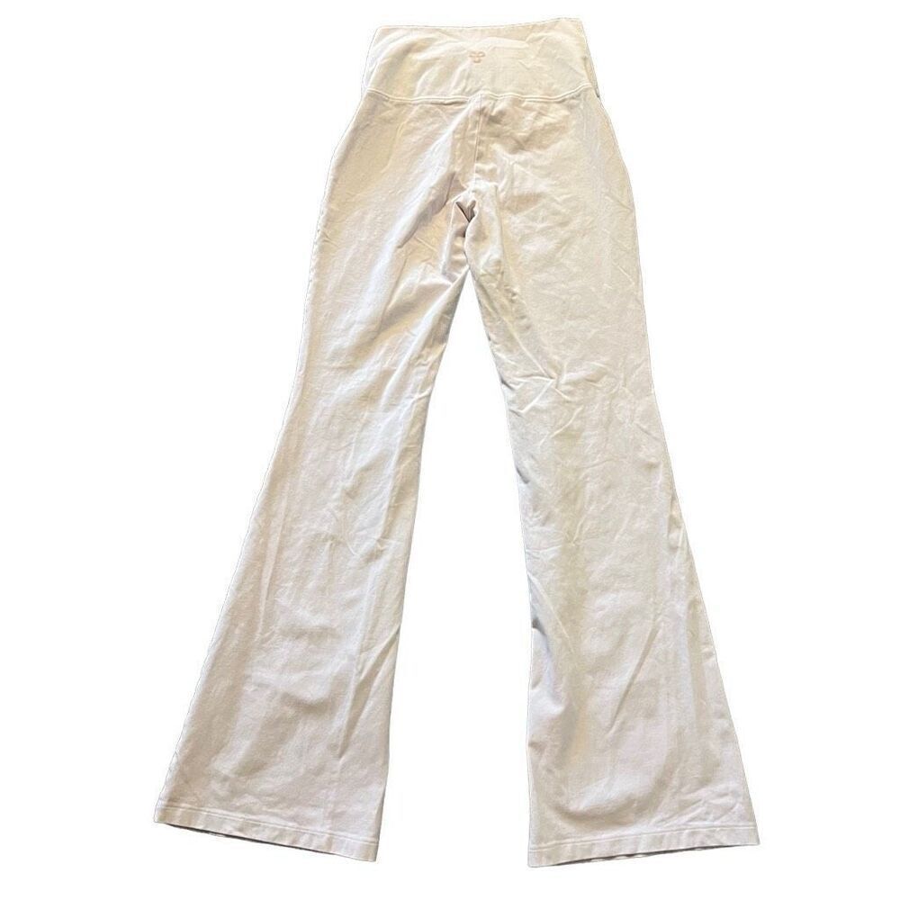Aritzia TNA blush pink flared leggings size small